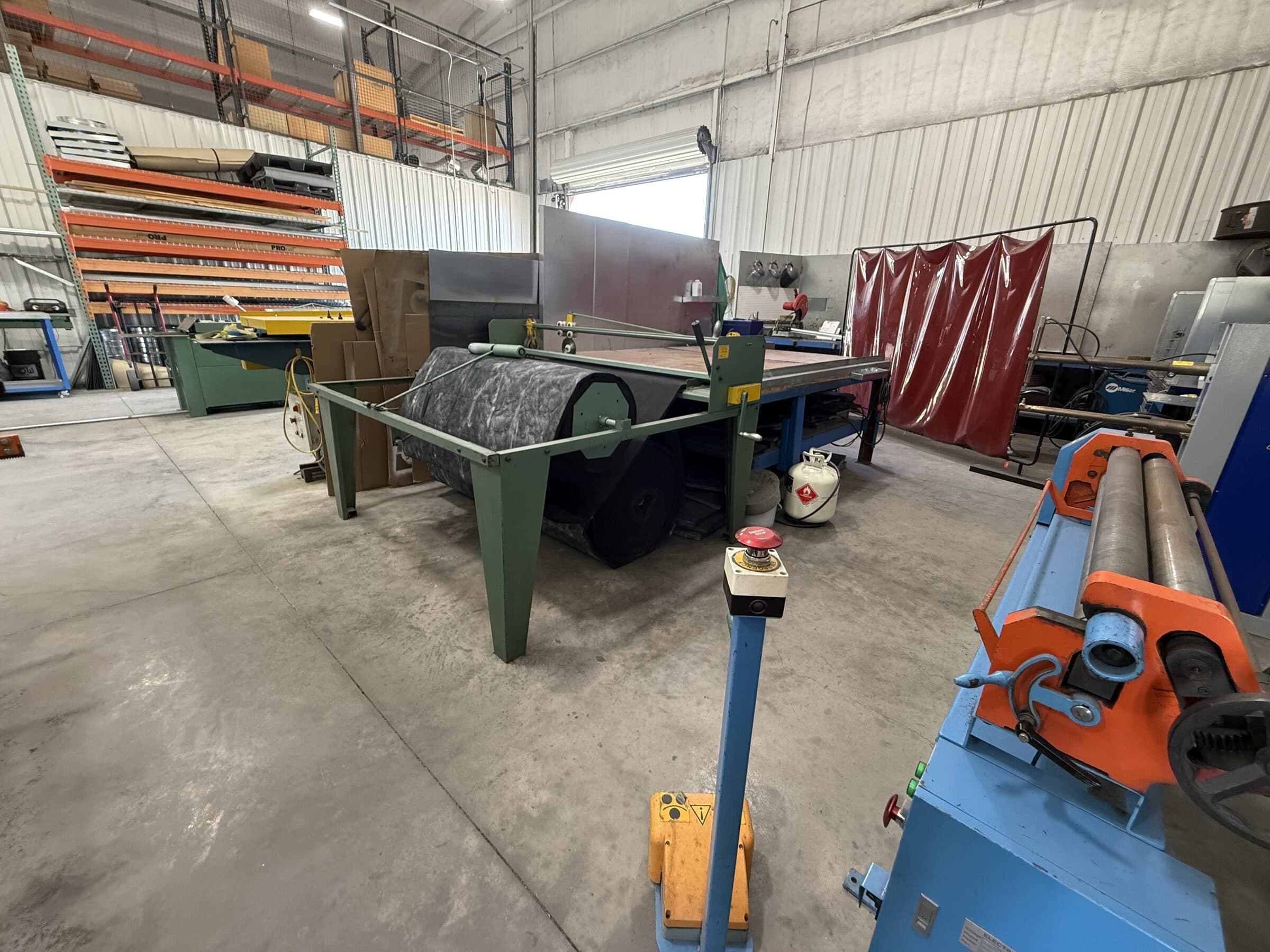 Sheet material storage beside the shop production area