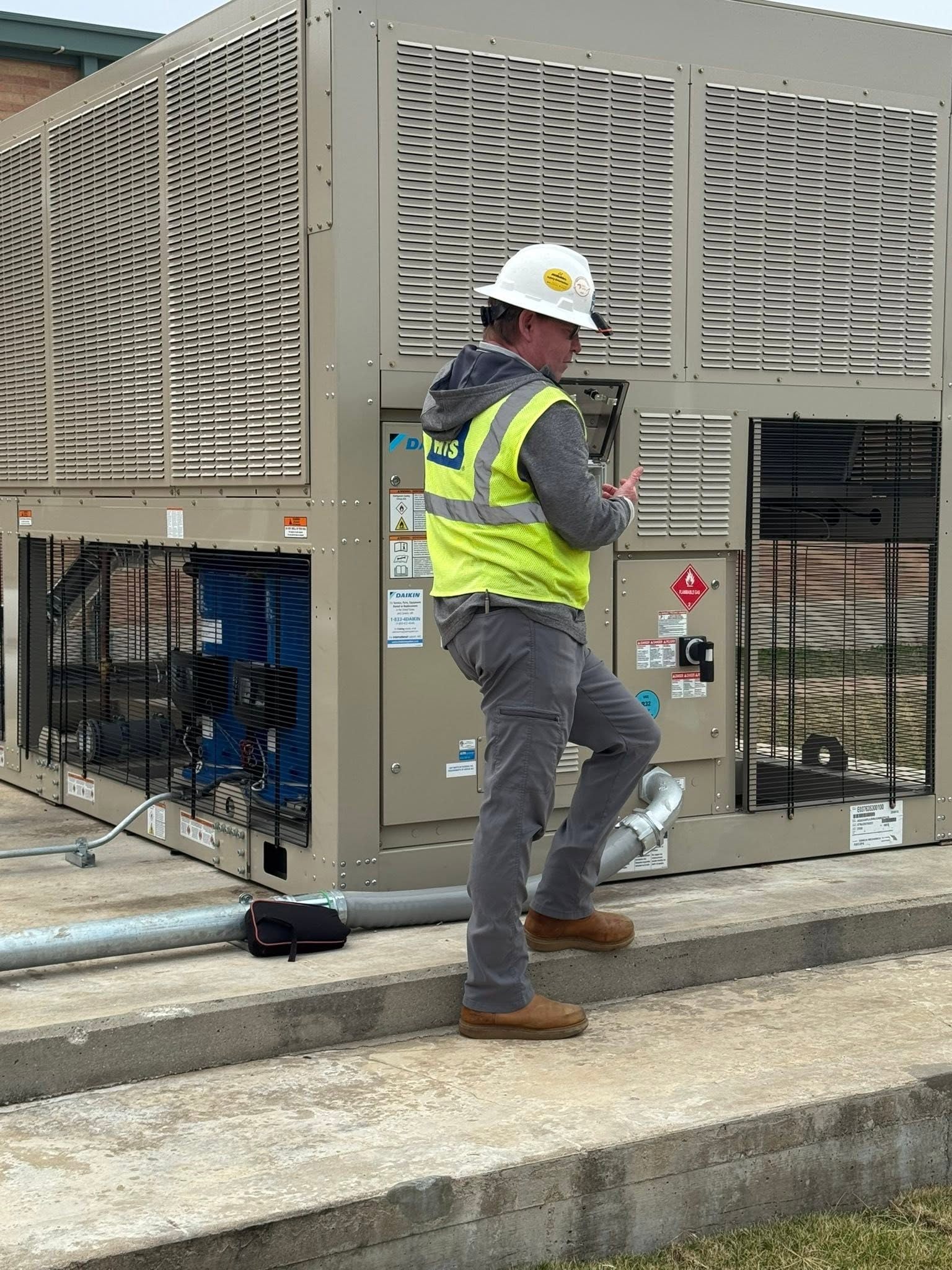 Seneca Mechanical technician servicing commercial equipment